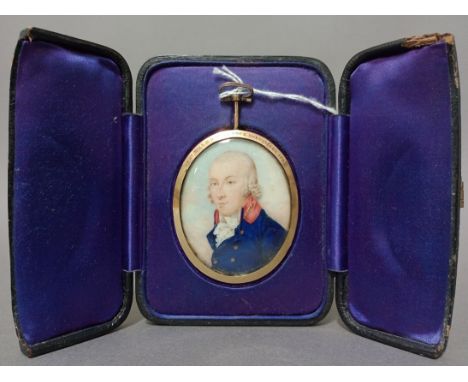 An 18th century portrait miniature of Andrew Hill (1795), 60mm high in a yellow metal frame with plaited hair to the reverse,
