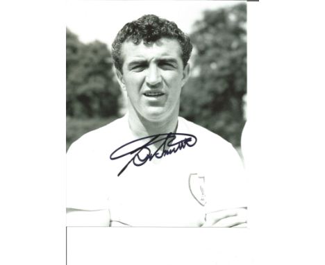 Bobby Smith 10x8 Signed b/w Photo Pictured In Tottenham Hotspur kit. Good Condition. All autographs are genuine hand signed a