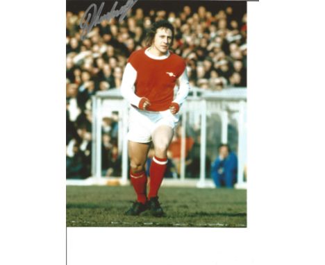 John Radford 10x8 Signed Colour Photo Pictured In Action For Arsenal. Good Condition. All autographs are genuine hand signed 
