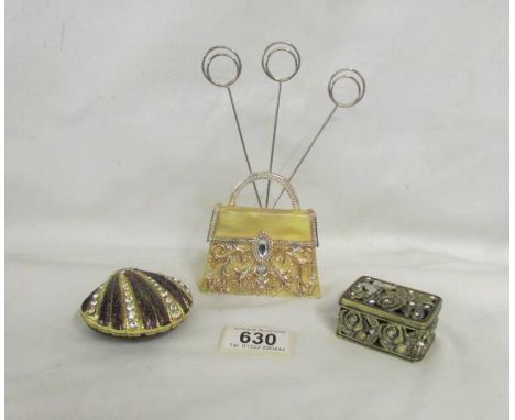Two decorative pill boxes and one other item.
