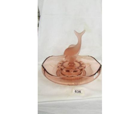 A pink glass rose bowl with fish finial.