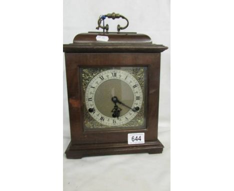 A mahogany chiming bracket clock.