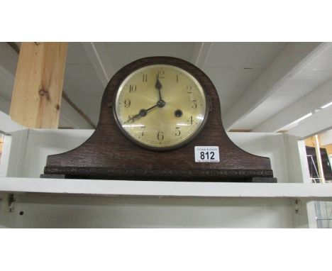 An eight day mantel clock.