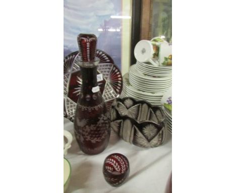 A ruby overlaid glass decanter and three dishes.&nbsp;&nbsp;(Collect only).