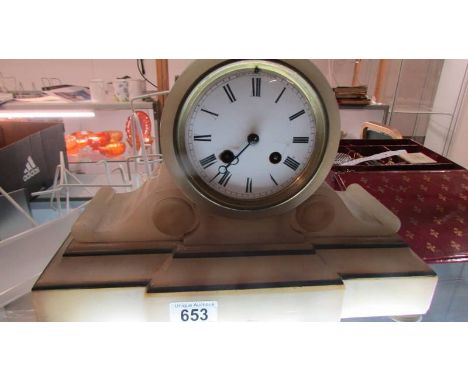 An alabaster mantel clock.&nbsp;&nbsp;(Collect only).