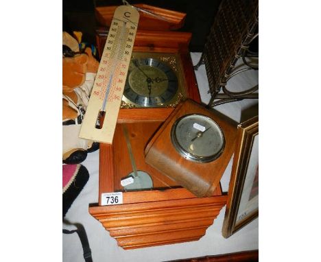 A wall clock, a barometer and a thermometer.&nbsp;&nbsp;(Collect only).