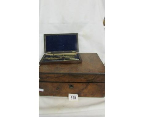 A Victorian writing slope (a/f, hinges need repair) and a geometry set.