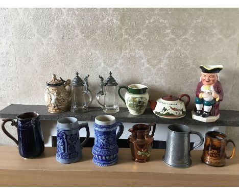 A quantity of Steins including a pair of blown glads with heavy pewter mounts, stoneware examples etc, Torquay ware teapot, D