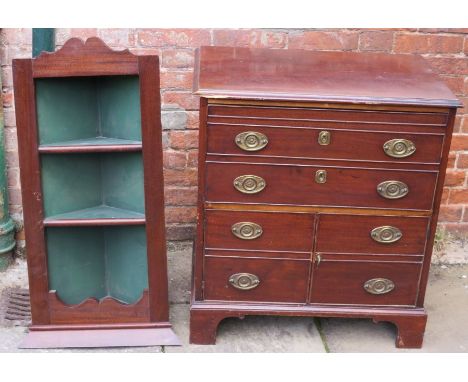 A 19th century mahogany commode with deep frieze drawer modelled as two drawers above a pair of doors modelled as drawers, og