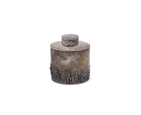 An Edward VII silver tea caddy, repousse design of people in a rural landscape, Chester, 1901, 9cm high, weight 85g.Condition