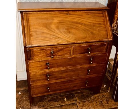 An Edwardian mahogany fall front bureau, circa 1910, rectangular moulded edge top, over a fall front slope with satinwood and