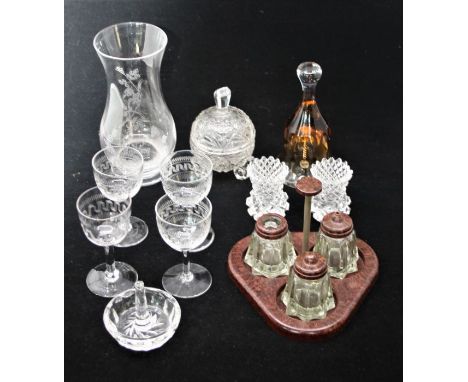 A collection of glass, including a glass and Bakelite cruet set, an engraved glass Ruby Wedding Vase by Michael Virden in its