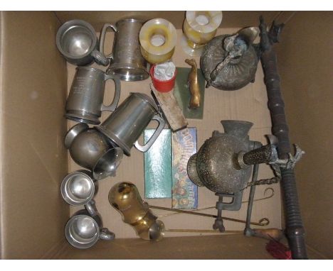 A small collection of pewter, brass toddy labels, an irons No.2, a mincer and a reproduction war axe.&nbsp;