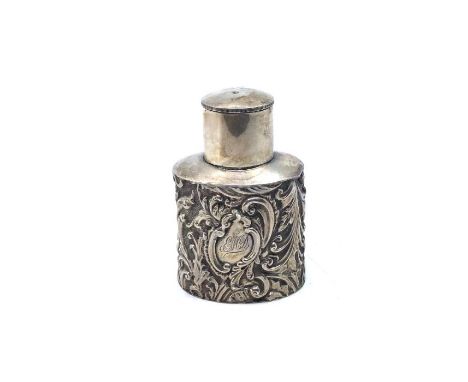 A late victorian silver tea caddy, foliate repousse design on a stippled ground, with a monogramed cartouche, Birmingham, 189