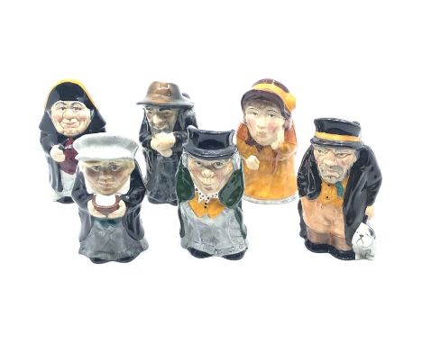Six novelty Oliver Twist character ceramic jugs (6)