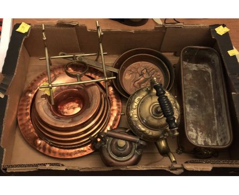 A collection of Kitchenalia, comprising:- a brass kettle on stand, two copper pans, a copper jelly mould and plate, a further