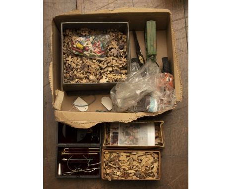 A jigsaw from the Disabled soldiers and sailors workrooms branch, in original box, two other jigsaw puzzles, a Tru-scale meta