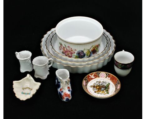A collection of porcelain by various makers including:- two Royal Worcester Evesham pattern flan dishes, two items of Royal W