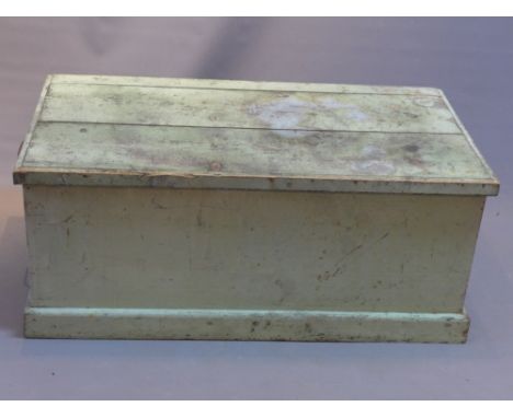 A twin handled green trunk with distressed finish having rising hinged lid, H:41cm W:98cm D:51.5cm
