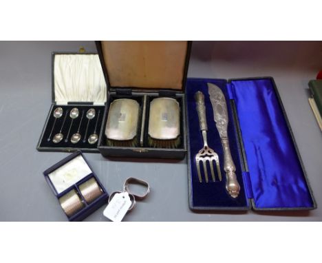 A collection of 20th Century silver comprising a set of six coffee spoons, Birmingham 1932, a pair of boxed napkin rings, Har