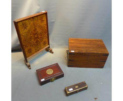 A mahogany inlaid walnut firescreen with three boxes