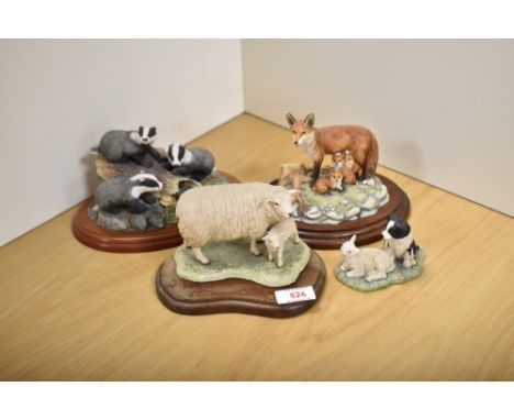 A group of four Border Fine Arts animal groups, comprising 'Fox Family' RW25 from the Chiltern Collection, 'Texel Ewe and Lam