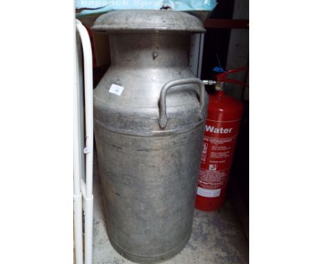 A vintage galvanized milk churn