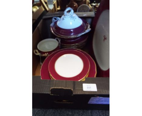 A selection of Royal Worcester dinnerware with burgundy and gilt decoration