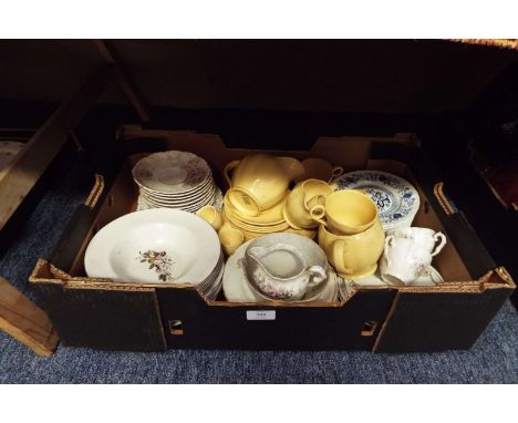 Two boxes of assorted china to include gravy boat, saucers, side plates, bowls etc