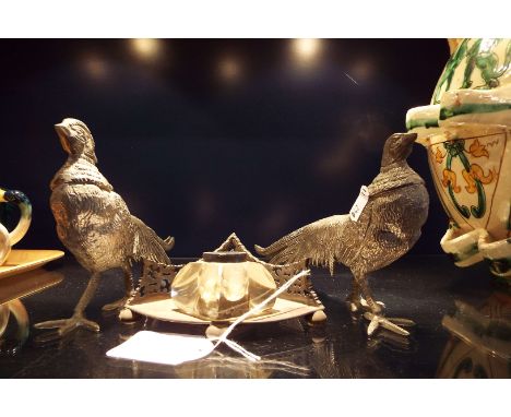 A pair of silver plated menu holder pheasants and a silver inkwell