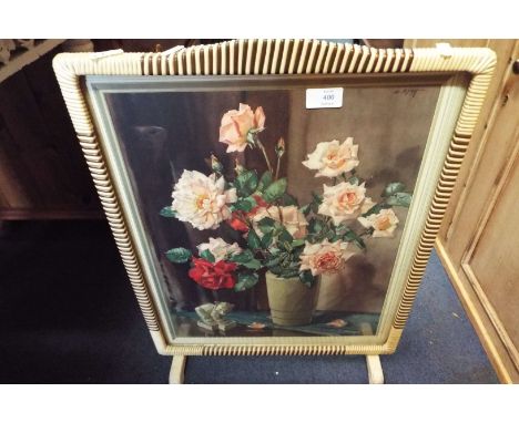 A vintage fire screen 