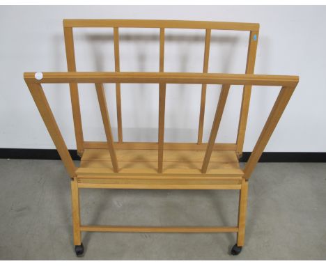 A beech MABEF M40 print rack,  four castor for mobility with lever brake, 103cm tall,  80cm long, 