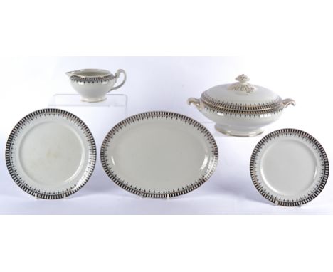A contemporary ceramic dinner service, decorated with a black and white geometric pattern, comprising two lidded tureens, two