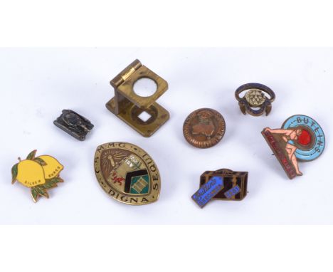 A collection of mid 20th Century badges, comprising enamelled 1950 &amp; 1951 Butlin's Skegness badges, a British Legions ena