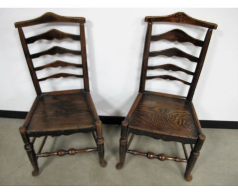 A pair of 19th Century ladder back chairs, shaped back splats, elm seats and a turned front stretchers, width  46cm x seat he