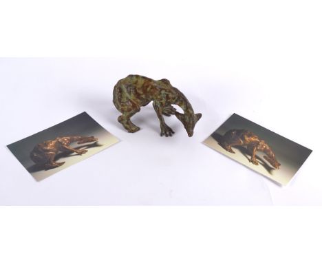 Sioban Coppinger (Contemporary British) a bronze study entitled 'Arrow Creature', with crouching body and surreal arrow shape