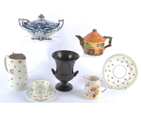 A Royal Albert part coffee service, comprising nine cups, twelve saucers, twelve small plates, two large plates, a teapot, mi