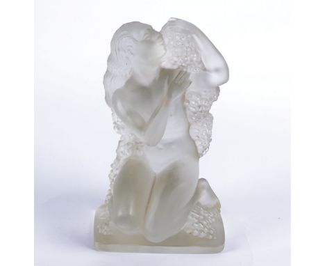 A Rene Lalique glass 'Summer' figure, from the Four Seasons series, modelled as a nude female kneeling beside flowers and gra