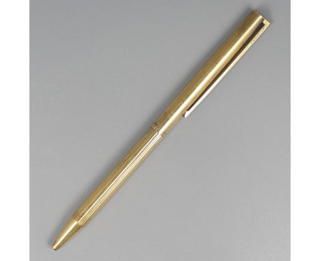 S.T. Dupont ballpoint pen silver. A silver ballpoint pen with gold plated design. The metal gold plated clip is provided with