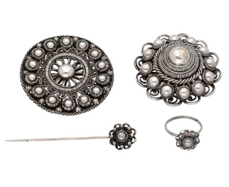 Silver Set of Zeeland buttons brooches, tie pin and ring In good condition. Hallmarks: Dutch assay mark 925 old sword: 1906-1