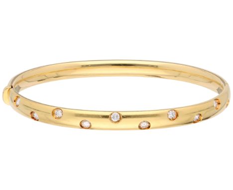 18K Yellow gold bangle bracelet set with approx. 0.50 ct. diamond. Set with ten brilliant-cut diamonds totalling about 0.50 c