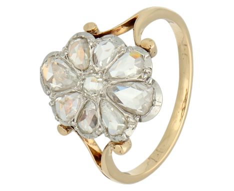 Oval ring set with eight pear-cut rose diamonds and a 1 round. In good condition, 1 diamond has a chip. The stones are set in