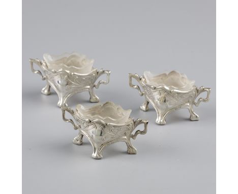 3-piece set ''Art Nouveau'' salt cellars with silver spoons. Set of three salt cellars, each with a salt spoon. Executed in f