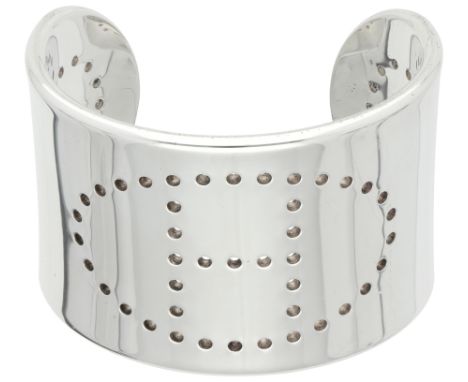 Hermès sterling silver cuff bracelet 'Eclipse' The 'H' in an oval is perforated in the bracelet. With Hermès jewellery box an