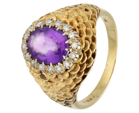 14K Yellow gold entourage ring set with approx. 1.71 ct. amethyst. and diamonds 1960s ring set with oval faceted amethyst of 