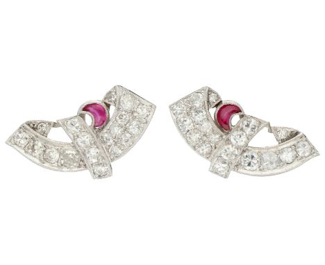 Platinum ear studs set with approx. 0.80 ct. diamond and synthetic ruby Bow-shaped set with 36 Swiss-cut diamonds totalling a
