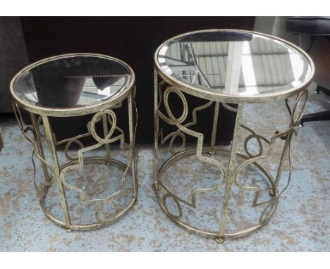 LAMP TABLES, two matching with circular bevelled mirror tops on gilt trellis supports, small 36cm x 50cm H, large 45cm x 60cm