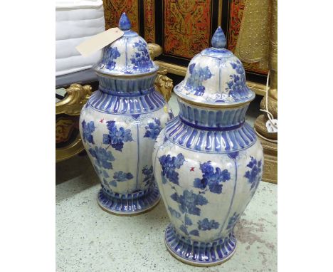 TEMPLE VASES, a pair, blue/white ceramic, with lids, each 60cm H. (2)