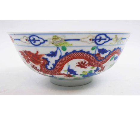 18TH CENTURY CHINESE CERAMIC BOWL, decorated dragons and birds of paradise, 20cm diam x 8cm H. (small chip to rim)