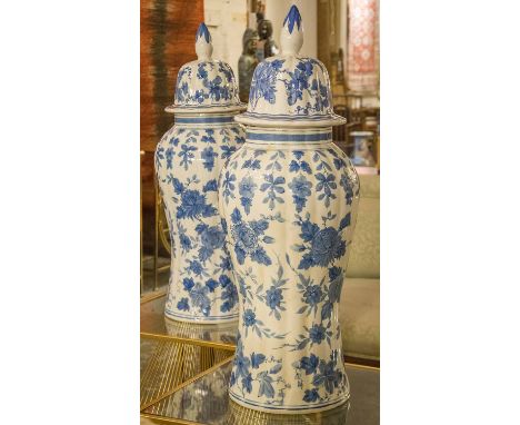 LIDDED URNS, a pair, large Chinese blue and white ceramic urns with lids, 64cm H. (2)